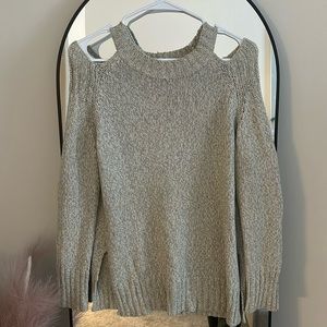 Francesca’s lightweight, cream and grey sweater with cold shoulder cut outs